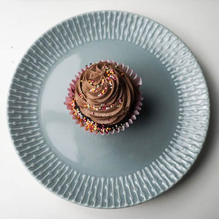 Chocolate cupcakes on a grey plate